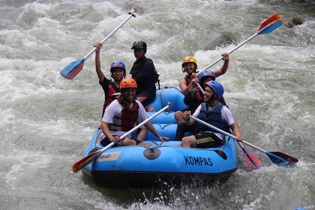A certified rafting guide leading a safe, well-equipped trip in Albania